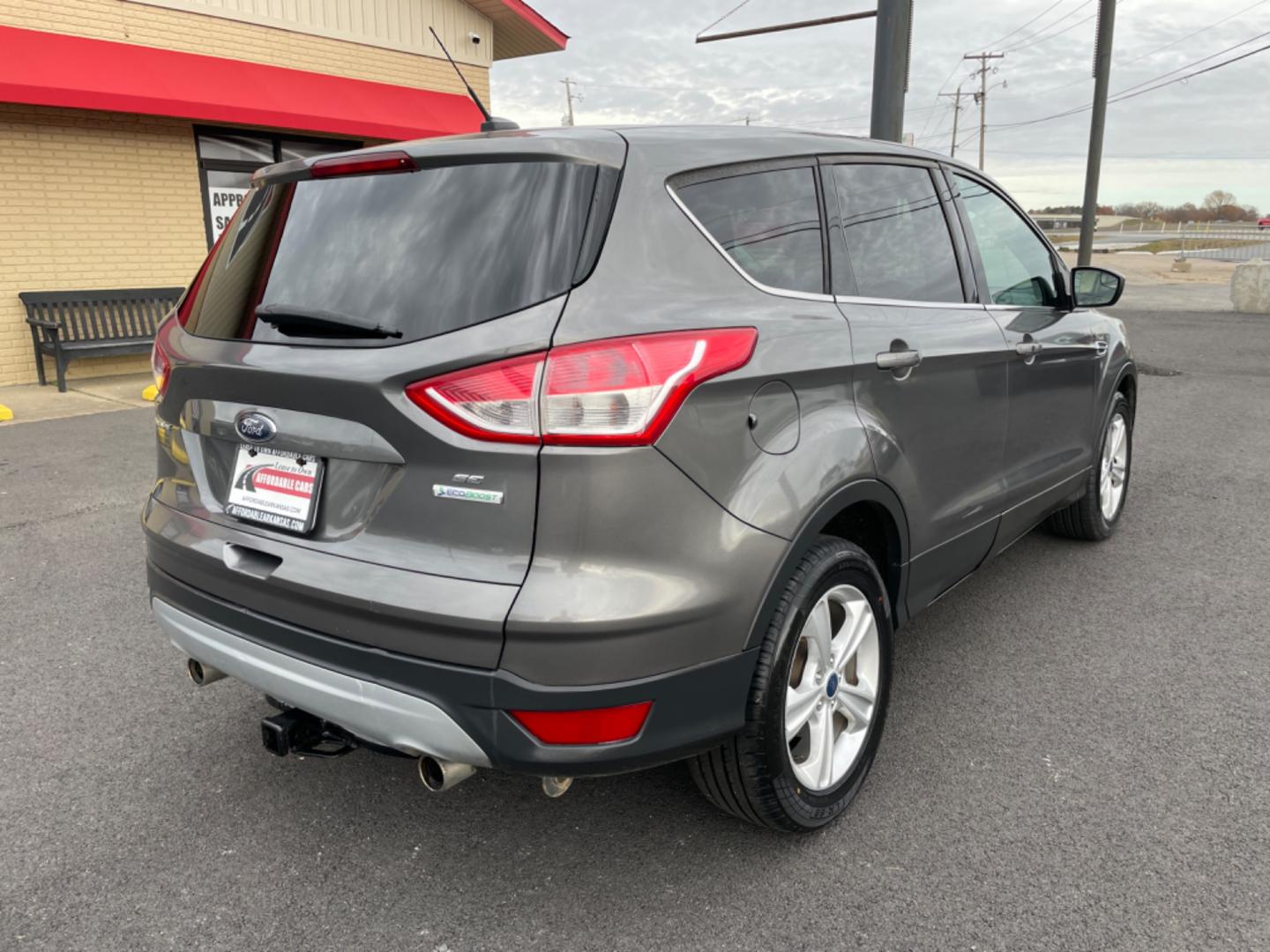 2013 Gray Ford Escape (1FMCU0GX1DU) with an 4-Cyl, EcoBoost, 1.6L engine, Auto, 6-Spd w/SelShft transmission, located at 8008 Warden Rd, Sherwood, AR, 72120, (501) 801-6100, 34.830078, -92.186684 - Photo#7